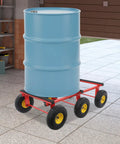 Heavy Duty Furniture Moving Cart With Smooth Rolling Inflatable Tires And Tough Steel Frame For Absolutely No Sweat Hauling Massive Couches And Appliances Through Doorways Or Driveways with a blue barrel on wheels in a garage.