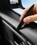 Using a 5 Piece Car Trim Removal Tool Kit With Auto Clip Pry Tools For Door Panels Dashboard Fasteners And Push Pins Easy To Use tool on car door.