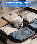 Slick Foldable Mini Washing Machine With 1.6 Liter Capacity And Rechargeable Power for easy washing in a suitcase with packed clothes.