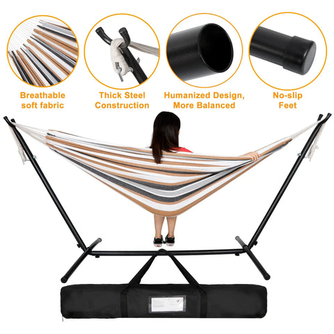 Two Person Portable Hammock With 9 Foot Stand, Heavy Duty 620 Lbs Capacity, woman standing inside striped hammock setup.