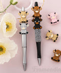 20 Pack Highland Cow Silicone Beads Set For DIY Jewelry And Crafts on pens, featuring cute cattle spacers, 5 color options displayed