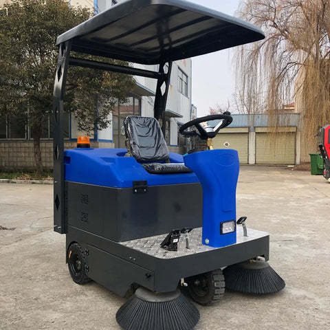 Big Boss Ride On Floor Sweeper For Factory And Warehouse. Heavy Duty Commercial Cleaning Machine With Custom Configs To Handle Industrial Debris. Get This Bad Boy Sweeper Today For A Spotless Space.
