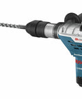 Dust Collection Attachment For SDS Max Hammer Drill With Dual Air Chambers And Wall Suction in use with vacuum nozzle