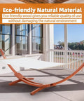 13 Ft Hammock With Stand For Two People Heavy Duty Outdoor Hammock Bed 550 Lb Capacity Breathable Skin Friendly Fabric Sturdy Arc Frame With Chains Ideal For Porch Patio Balcony Garden Backyard Chill White Yellow displayed on a sunlit patio with eco-friendly wooden stand.