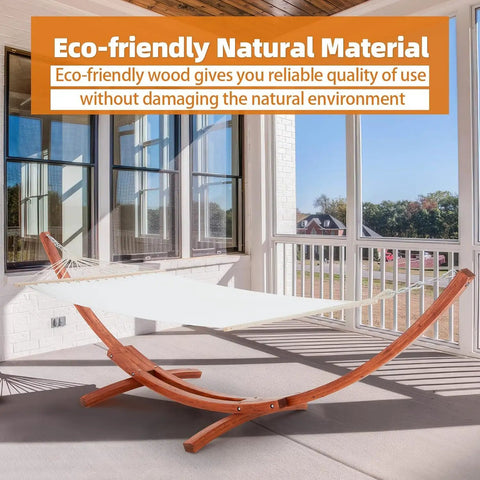 13 Ft Hammock With Stand For Two People Heavy Duty Outdoor Hammock Bed 550 Lb Capacity Breathable Skin Friendly Fabric Sturdy Arc Frame With Chains Ideal For Porch Patio Balcony Garden Backyard Chill White Yellow displayed on a sunlit patio with eco-friendly wooden stand.