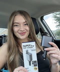 Hella Quick Retractable Car Charger Featuring Four USB C Ports And 120 Watt Output held by a woman in a car, showcasing package details.