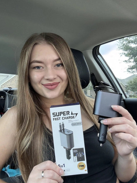 Hella Quick Retractable Car Charger Featuring Four USB C Ports And 120 Watt Output held by a woman in a car, showcasing package details.