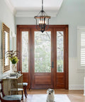 Farmhouse 4 Light Cage Chandelier With Black Metal Finish And Faux Wood Rustic Lantern Pendant Light in a bright foyer