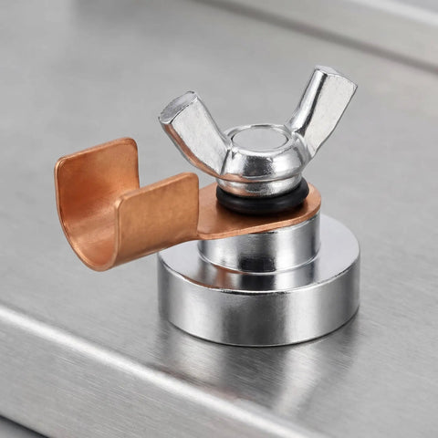 Close-up of a Five Piece Magnetic Welding Ground Clamp Set That Slaps Securely To Any Metal For Heavy Duty Jobs with copper arm.