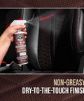 VentRight Perforated Leather Cleaner And Conditioner for car seats being sprayed on a black leather car seat, 16 oz.