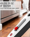 Kick Up Some Serious Grime And Nail The Clean Every Single Time Ditching Harsh Chemicals With This Reliable Multipurpose Steam Mop For Slick Hardwood And Tile Floors, user filling 19 oz water tank for longer cleaning.