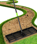 Lawn Leveling Rake 30x10 Built Tough With Anti Flip Design, 76 Inch Handle, leveling soil on a garden path.