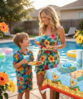 Mother and child at poolside with Tropical Island Party Supplies Set for 10 Guests with Polynesian Style Disposable Tableware