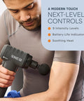 Man using Sonic LX Heated Massage Gun For Deep Tissue Muscle Recovery In Beast Mode With Nine Speeds And Ten Heads