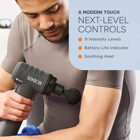 Man using Sonic LX Heated Massage Gun For Deep Tissue Muscle Recovery In Beast Mode With Nine Speeds And Ten Heads