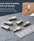 Heavy Duty 80 Piece 5mm Iron Shelf Pegs Nickel Plated Spoon Shape Cabinet Supports shown beside a ruler