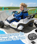 Child riding a 12V Kids Electric Drift Go Kart For Ages 4 And Up With Music And LED Lights Swivel Rear Wheels Adjustable Seat Belt Outdoor Ride On Toy For Boys And Girls White Finish Safe Speed Around 4.9 MPH on a track.