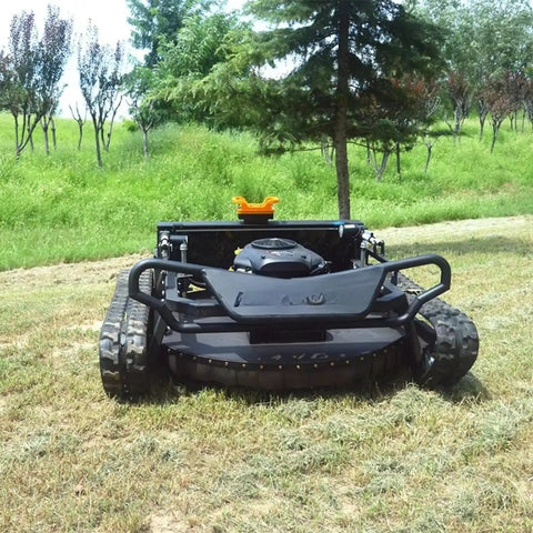 Remote Control Grass Cutter With Tracks For Slopes And Uneven Terrain in grassy field