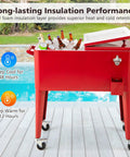 Red 80 Quart Rolling Ice Chest Cooler on Wheels with Bottle Opener and Cap Catcher by poolside
