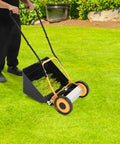 14 Inch Manual Push Reel Lawn Mower With Collection Bag And Sweeper For Easy Yard Work No Fuss 4 Sharp 5 Edged Blades For Lawns Gardens Yards Parks Golf Courses Sidewalks Driveways in use on grass