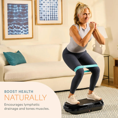 Woman exercising on Waver Mini Vibration Plate For Full Body Toning And Lymphatic Drainage With Remote And Bands in living room
