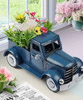 Farmhouse Blue Truck Tabletop Decor with colorful flowers, vintage car design for shelves and desks, adding rustic farmhouse vibe.