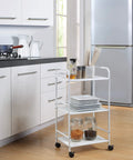 Three Tier Rolling Utility Cart With Metal Shelves On Wheels White Finish For Kitchen Office And Home Organization, in use.