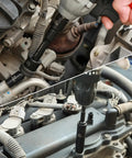 Mechanic using Heavy Duty Three Eighths Inch Drive Impact Socket Set, Forty Nine Piece SAE And Metric, on vehicle engine for repair.