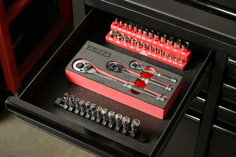 12 Piece One Quarter Inch Drive Metric Flex Socket Set With 6 Point Sockets From 5mm To 15mm displayed in tool drawer