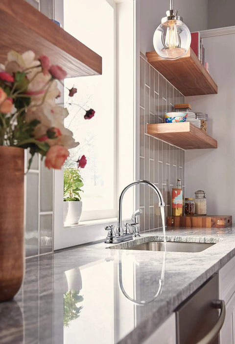 Two Handle Kitchen Sink Faucet With Side Sprayer Chrome Finish For 8 Inch 4 Hole Install in modern kitchen setting