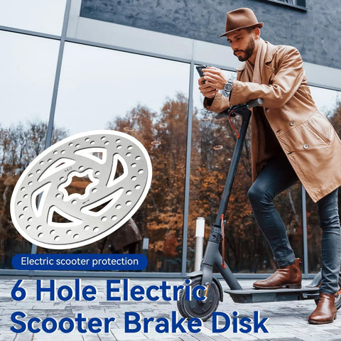 140mm Stainless Disc Brake Rotor With 6 Bolt Mount For Bikes And Electric Scooters in use with city background