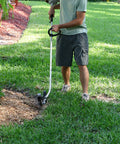 Person using an edger with 3 Pack 8 Inch By 2 Inch Edger Blades With 1 Inch Center Hole Fits Stihl Ego Echo Ryobi Kobalt Edgers Plus More Replacement