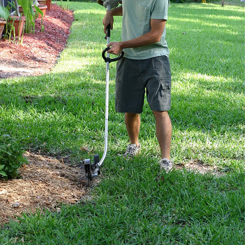 Person using an edger with 3 Pack 8 Inch By 2 Inch Edger Blades With 1 Inch Center Hole Fits Stihl Ego Echo Ryobi Kobalt Edgers Plus More Replacement