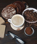 Premium Round Cowhide Coasters Set Of Twelve Natural Leather Drink Mats Ultra Smooth Finish with coffee and beans.