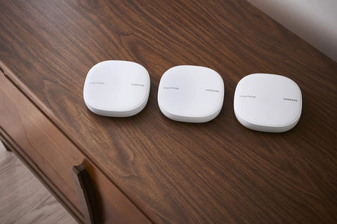 Three white units of All-In-One SmartThings WiFi Mesh Router And Hub For Whole Home Coverage With Zigbee And Z-Wave, ET WV525KWEGUS