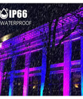 JUDYSSY 50W 100W 150W Led Uv Floodlight Ac220 displayed on a building, showcasing vibrant colors in rain, IP66 waterproof.