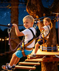 Children using an Aluminum Zip Line Kit With Heavy Duty Pulleys And Quick Setup Trolley Slider For Backyard Or Park at night.