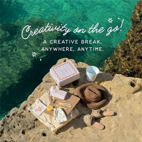 Air Dry Clay Pottery Kit For Adults Complete Craft Set With Tools Paints And Guide next to a hat on rocks by clear water