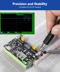 Portable Maker Friendly Breadboard Power Supply with Built-In Rechargeable Battery connected to a breadboard for testing