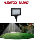 8 Pack Outdoor Led Flood Lights 30W 3000K Warm White Bronze Finish in use illuminating yard at night.