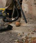 Person using Beast Of A 5 Gallon Wet Dry Shop Vacuum with 4 Peak HP Motor Stainless Steel Tank Portable Vac outdoors
