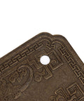 Detail view of Antique Bat Style Brass Drawer Pull Handle with intricate pattern and screw hole for cabinets wardrobes and dressers