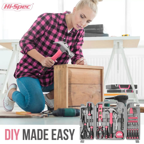 Woman using Pink 54 Piece Home DIY Tool Kit Set For Women Beginner Friendly Hand Tools In A Portable Toolbox Case For Home Office And Everyday Repairs