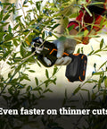 Person using 20V Nitro Pruning Shear And Lopper WG330 Cordless With Titanium Plated Blade Brushless Motor Ergonomic Grip on shrub