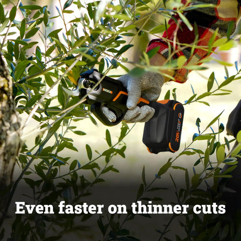 Person using 20V Nitro Pruning Shear And Lopper WG330 Cordless With Titanium Plated Blade Brushless Motor Ergonomic Grip on shrub