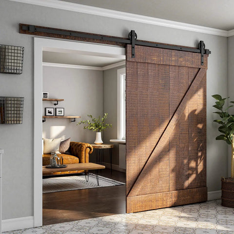 Heavy Duty Sliding Barn Door Hardware Kit With Reinforced Steel Rollers And Silent Tracks, showcasing a wood door and matte black rail in a stylish interior.
