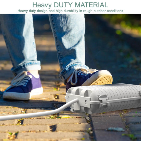 Tough As Nails Outdoor Waterproof Electrical Box, Large Extension Cord Cover With Nine Cable Ports on a path with shoes