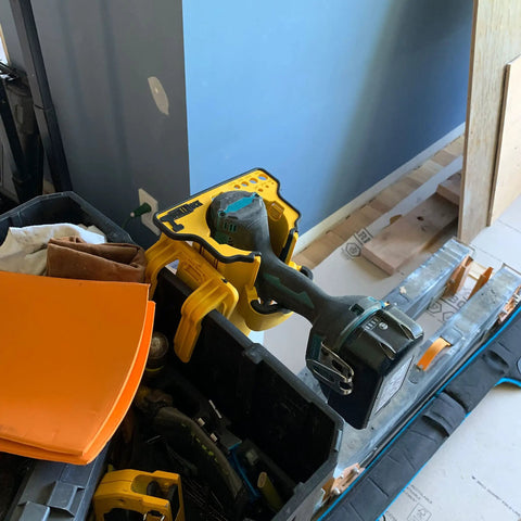 Grab And Go Drill Dock Organizer For Cordless Drills And Drivers With Universal Fit, Fixed Mount Or Side Clip in use on job site