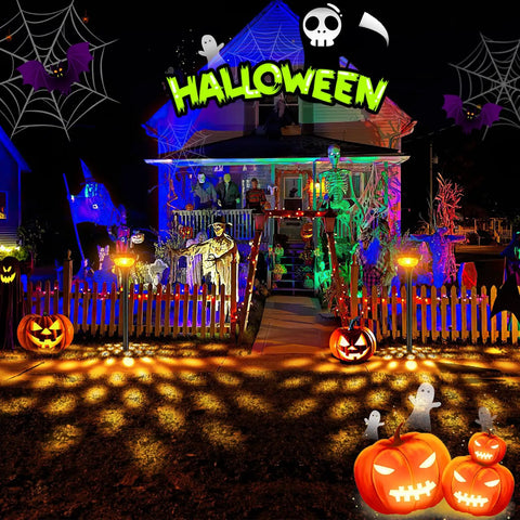 Halloween-themed house with vibrant decorations including pumpkins, ghosts, and skeletons, illuminated at night.