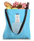 Maritime Captain Tote Bag For Boating And Sailing Enthusiasts, blue bag with polar bear design and black handles, filled with groceries